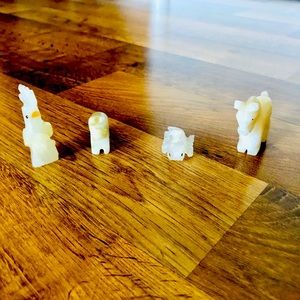 4 Small Stone Figurines